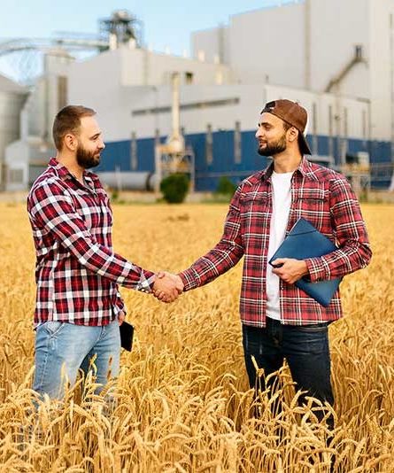 Two farmers shanking hands 